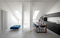004-sky-loft-renovation-brings-light-to-a-1970s-turin-attic-apartment.jpg